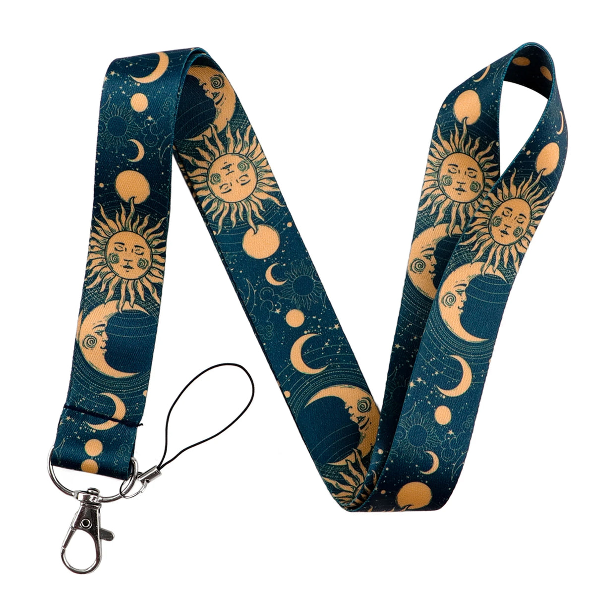 A dark teal lanyard featuring a repeating pattern of crescent moons and sun faces on an orange background.