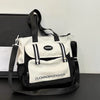 Weiße und schwarze Nylon-Korbtasche mit schwarzem Riemen und der Marke DUONINGBAGFASHION
