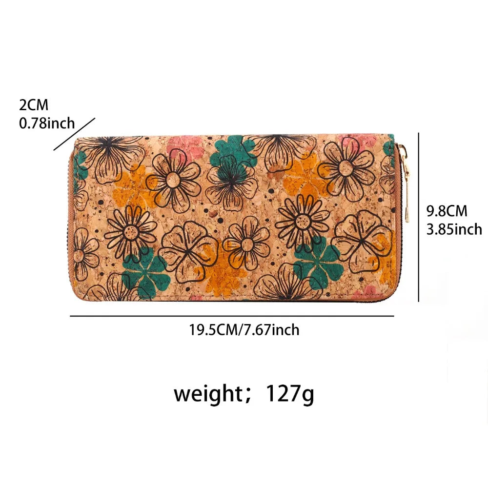 A rectangular wallet made of wood-grain leather featuring a floral pattern in orange, green, and brown tones.