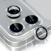A close-up view of a silver camera lens protector with a metal frame and glass lens, designed for an iPhone.