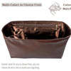 A brown leather bag organizer insert with a satin lining showing multiple color options for matching.