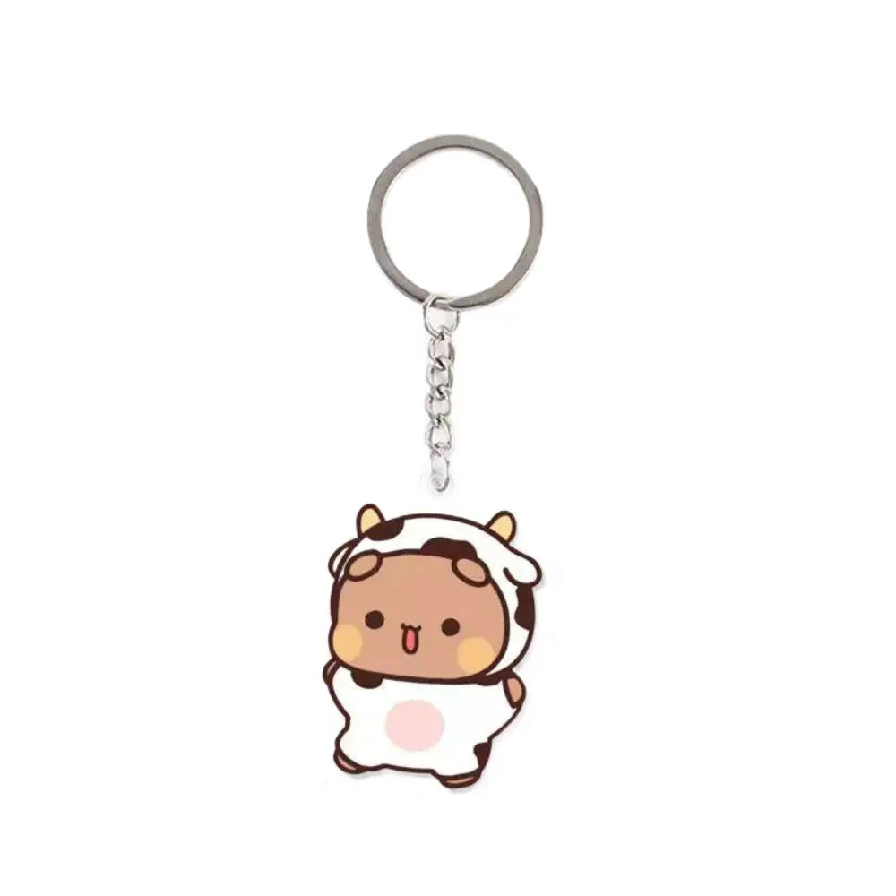 A cute cartoon character charm made of resin with a silver keyring.