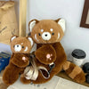 A brown red panda plush toy designed as a soft furry crossbody bag.