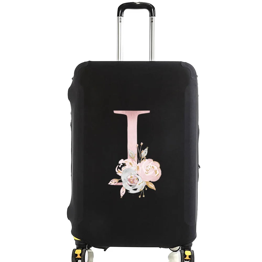 Black rolling luggage with a pink floral design on the cover
