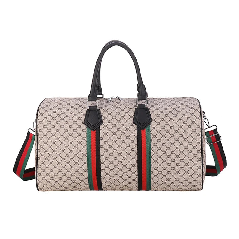 A beige plaid women's travel duffle bag with black handles and green and red stripes.