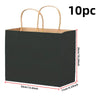 A black reusable kraft paper gift bag with natural twine handles, shown from the side.