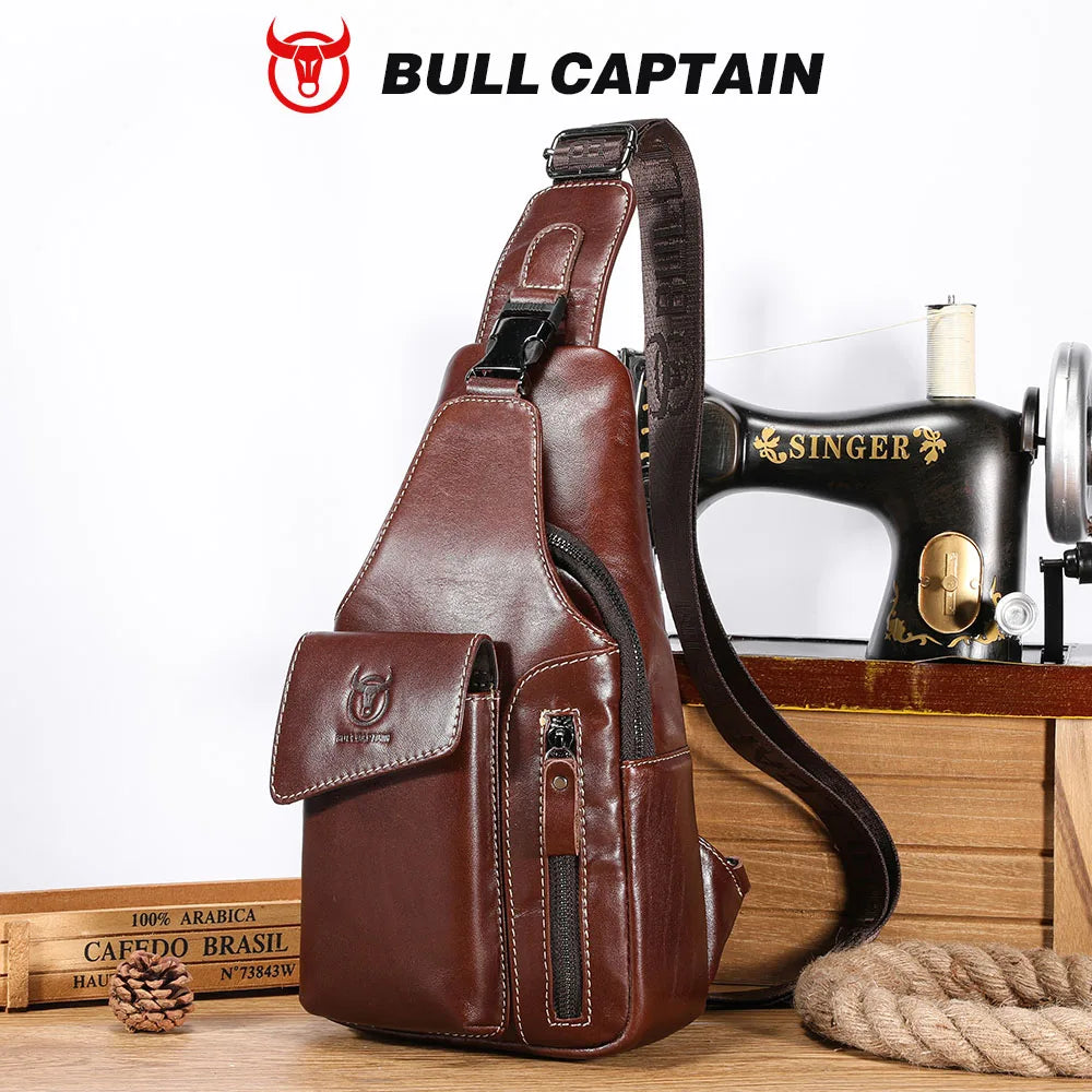 A brown genuine leather sling backpack with a Singer sewing machine visible in the background.