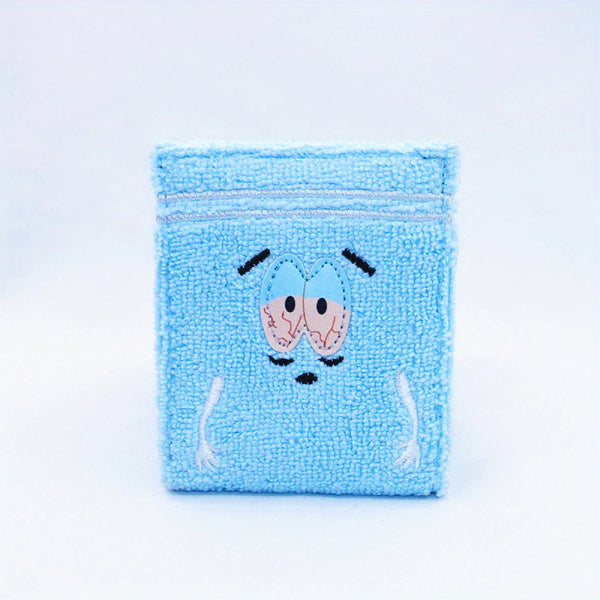 Portefeuille en tissu bleu clair brodé avec un visage sur le devant.
