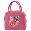 A pink insulated canvas lunch bag featuring a large letter U decorated with colorful flowers and butterflies.