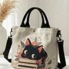 Beige Canvas Tote Bag mit Blumenkattenmuster und schwarzen Riemen