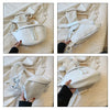A white PU leather crossbody saddle bag with a silver chain strap shown in multiple angles.