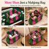 A green and pink striped knit storage bag used for organizing tiles, cosmetics, cards, and travel essentials.