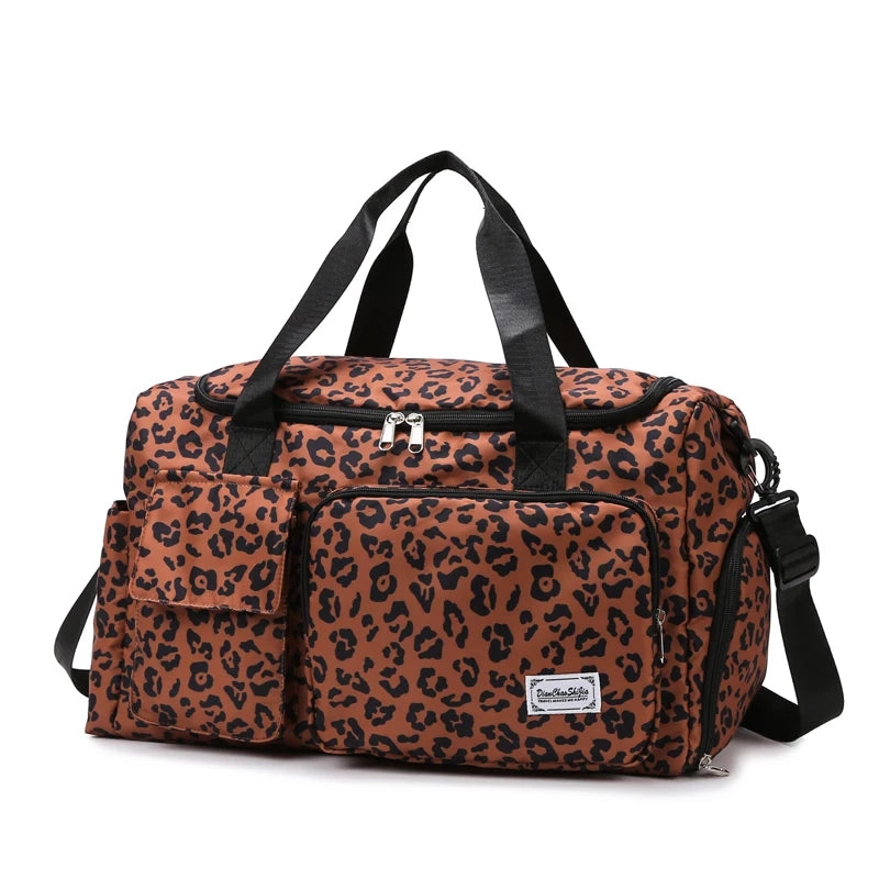 A brown leopard print travel duffel bag with black handles and a shoe compartment.