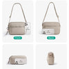 All-angle views of a beige crossbody shoulder bag showing front, back, bottom, and side perspectives.