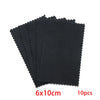A stack of ten black polishing cloths for silver and gold jewelry, measuring 6x10cm each.