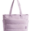 A lavender quilted tote bag with padded handles shown against a white background.