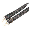 Black and green floral patterned nylon crossbody bag strap with gold-toned hardware