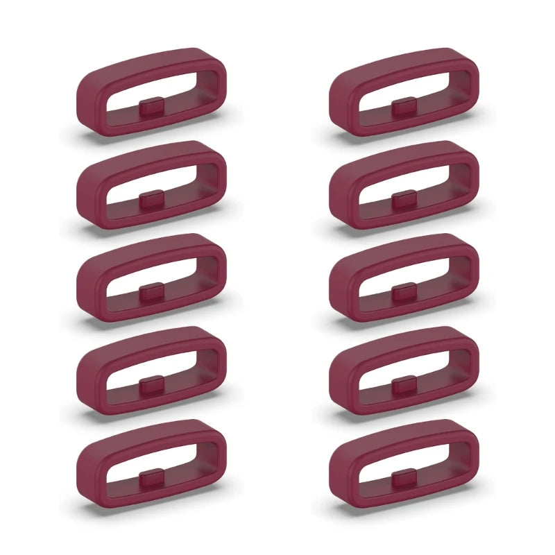 A set of five silicone watch strap retainer rings in a maroon or reddish-pink color.