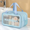 Light blue travel toiletry bag with a strap, featuring a clear window showing skincare products.