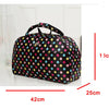 A black PU leather travel duffel bag with a handle, featuring a pattern of multi-colored polka dots.