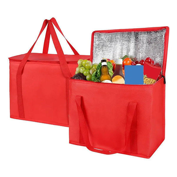 A red foldable insulated grocery and food cooler bag with a mesh lid showing fresh produce.