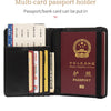 Black leather multi-card passport holder with various documents and a passport visible.