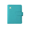 A teal leather passport organizer with a flap closure and an airplane logo embossed on the cover.