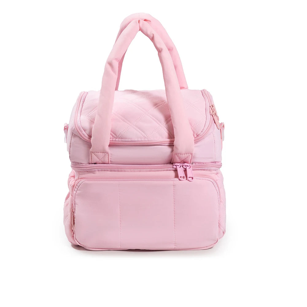 A pink quilted insulated lunch bag for women with a carrying handle.