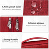Close-up view of a red organizer pouch showing anti-splash features, double zippers, and a sturdy carrying handle.