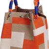 A knitted bucket bag featuring a geometric colorblock pattern in shades of orange, beige, and white with blue handles.