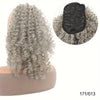 A bundle of gray kinky curly hair extensions with a black mesh top shown next to a pink hair holder.