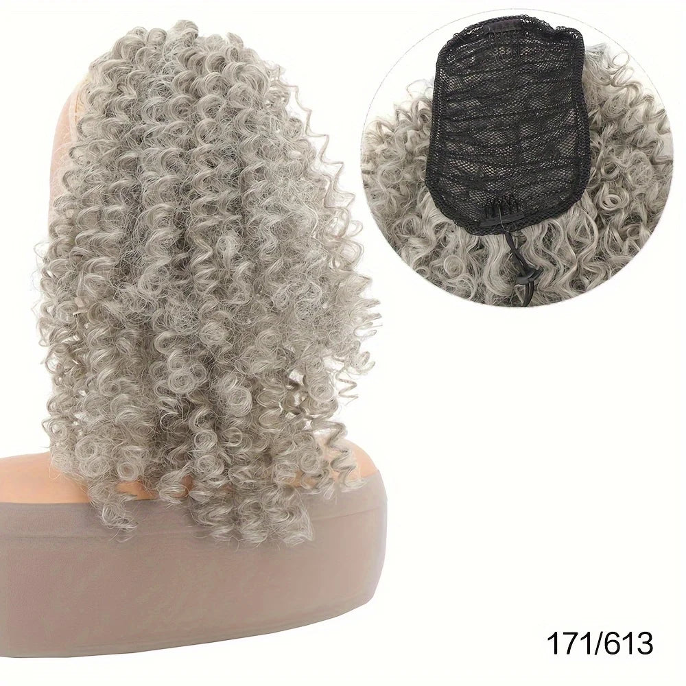 A bundle of gray kinky curly hair extensions with a black mesh top shown next to a pink hair holder.