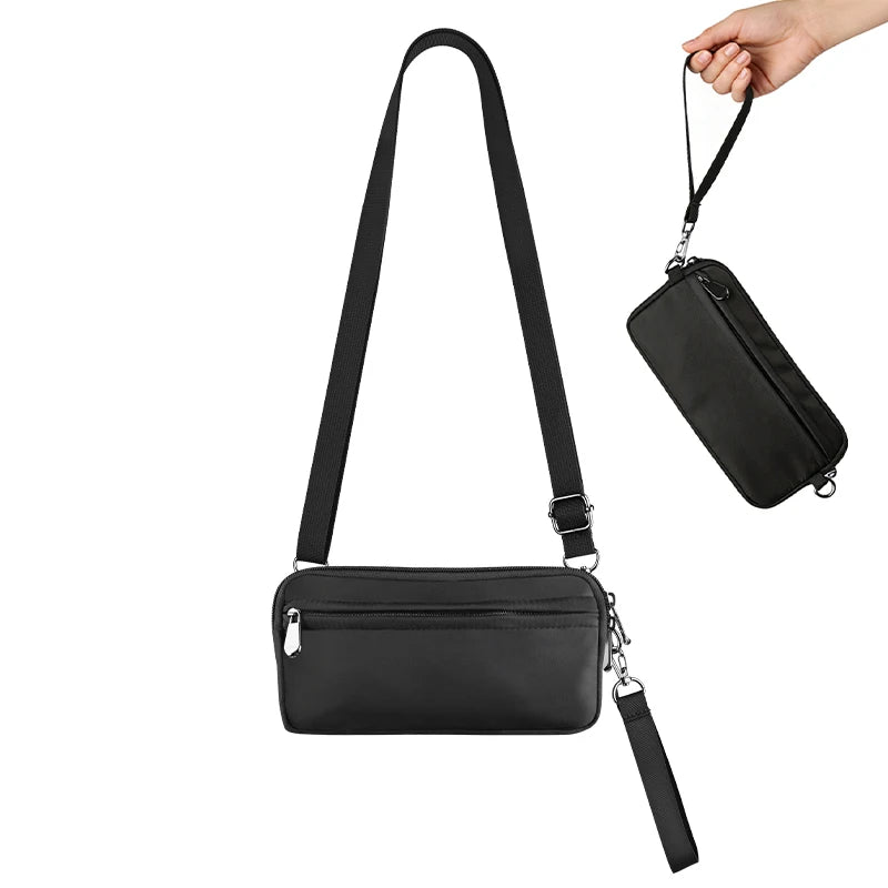 Black premium zipper phone pouch with a strap being held by a hand.