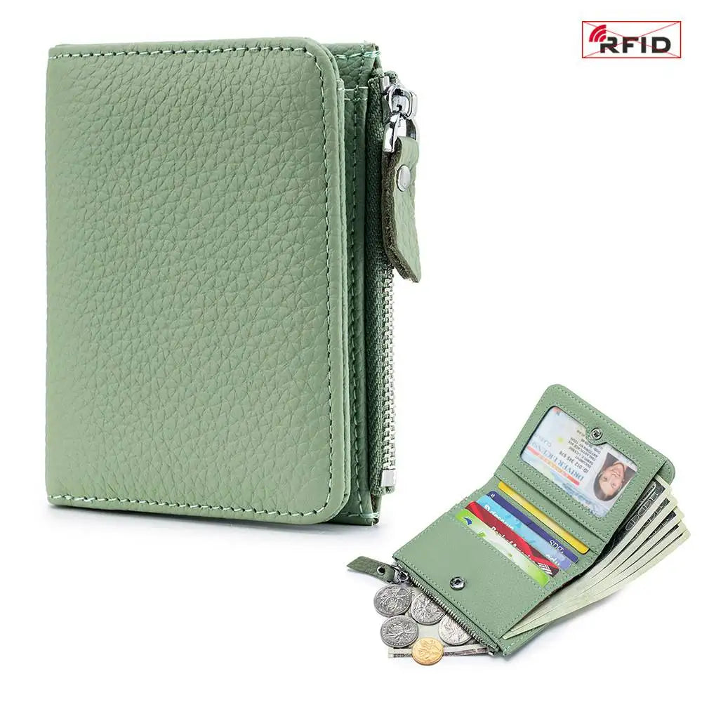 A light green genuine leather slim bi-fold wallet with a zipper closure.