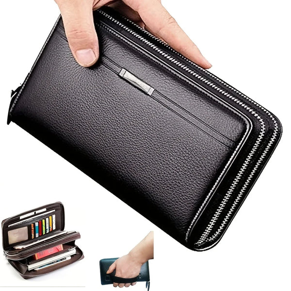 Une main ouvre un porte-monnaie pochette à fermeture éclair noire en cuir pour montrer son intérieur.