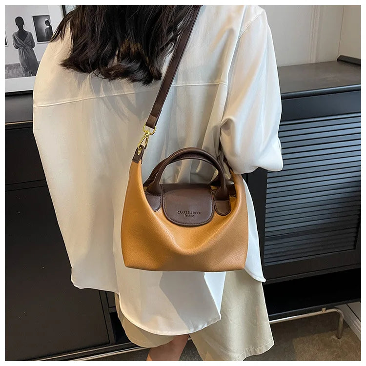 A light beige blouse is shown holding a tan vintage PU leather crossbody handbag.