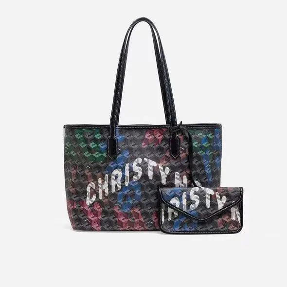 A dark, patterned tote bag set featuring a geometric design and personalized text on the front.
