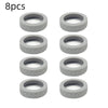 A set of eight gray silicone luggage wheel protection rings.