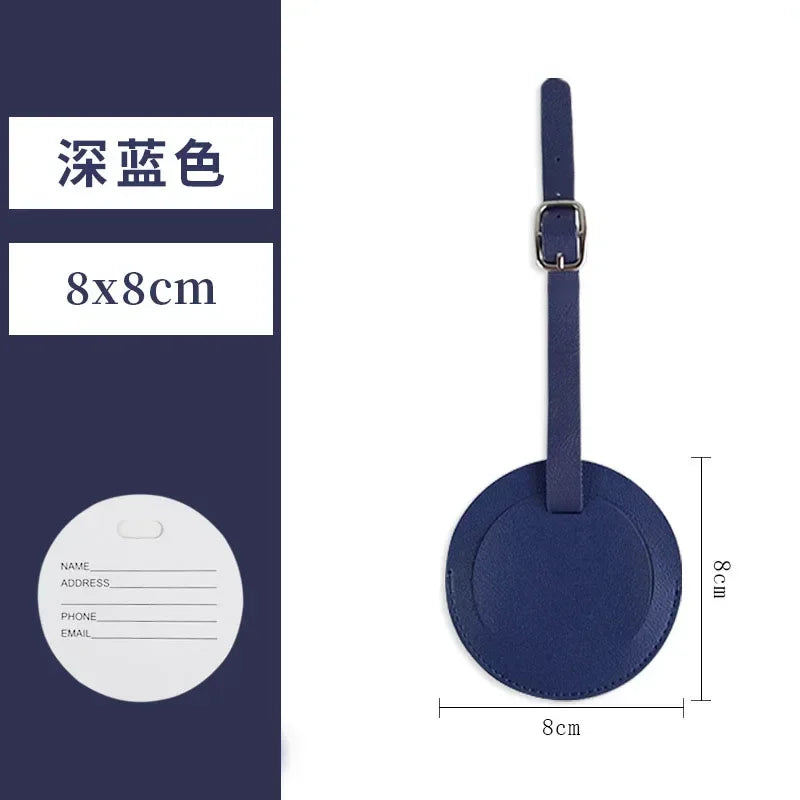 A dark blue PU leather luggage tag with a rectangular shape and a metal clip.