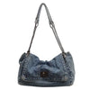 Vintage-inspired denim tote bag with a chain strap.