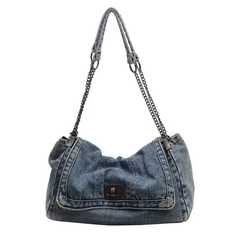 Vintage-inspired denim tote bag with a chain strap.