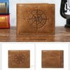 Brown leather wallet with a compass design embossed on the cover