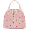 A pink corduroy lunch bag for kids with a textured fabric and small red strawberry pattern.