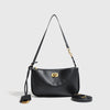 A black split leather shoulder tote bag with gold hardware shown against a light gray background.