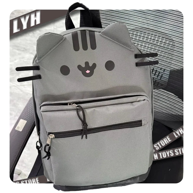 A gray Pusheen cat canvas backpack with black stripes and features a cute face design.