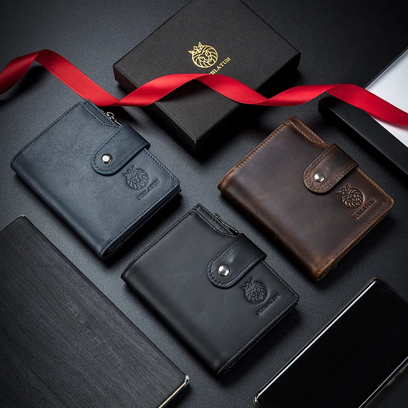 A collection of genuine leather men's business wallets and a red ribbon on a dark surface.