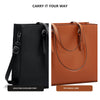 A pair of large capacity tote bags, one black with an adjustable shoulder strap and one brown with a top handle.