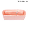 A pink felt bag insert organizer with a zipper closure.
