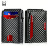 A black carbon fiber slim RFID protection wallet with a red interior card slot.