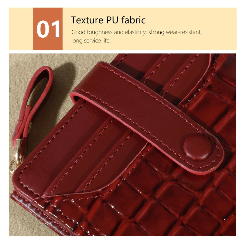 A close-up of a maroon PU fabric card wallet with a textured pattern and a leather strap.